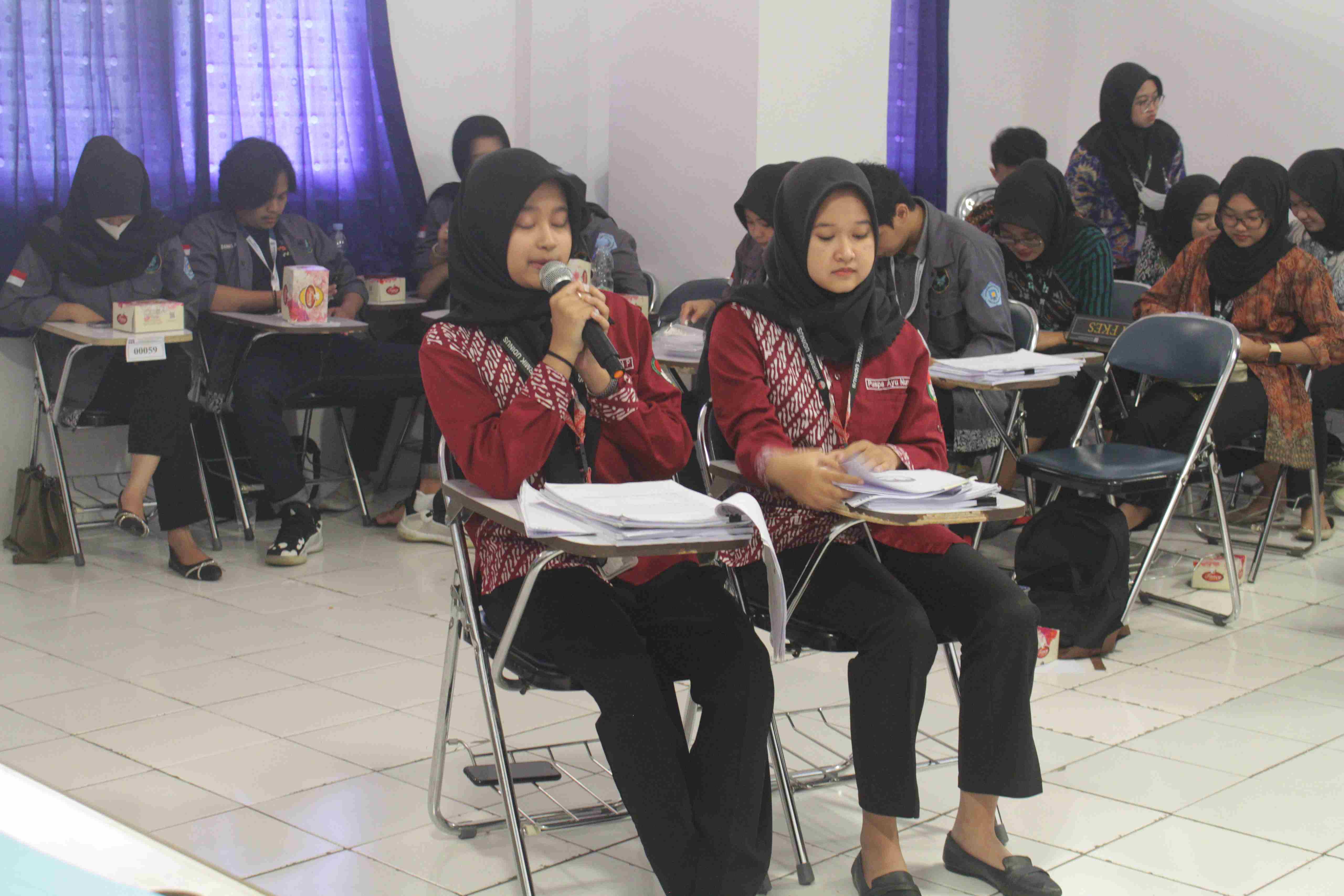 Sidang HMRMIK FKes